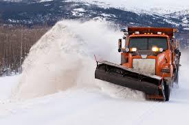 image of snow plow clearing road
